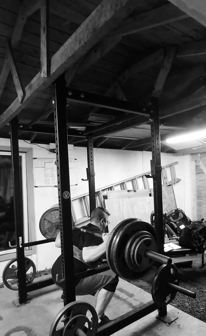 A picture of the author squatting